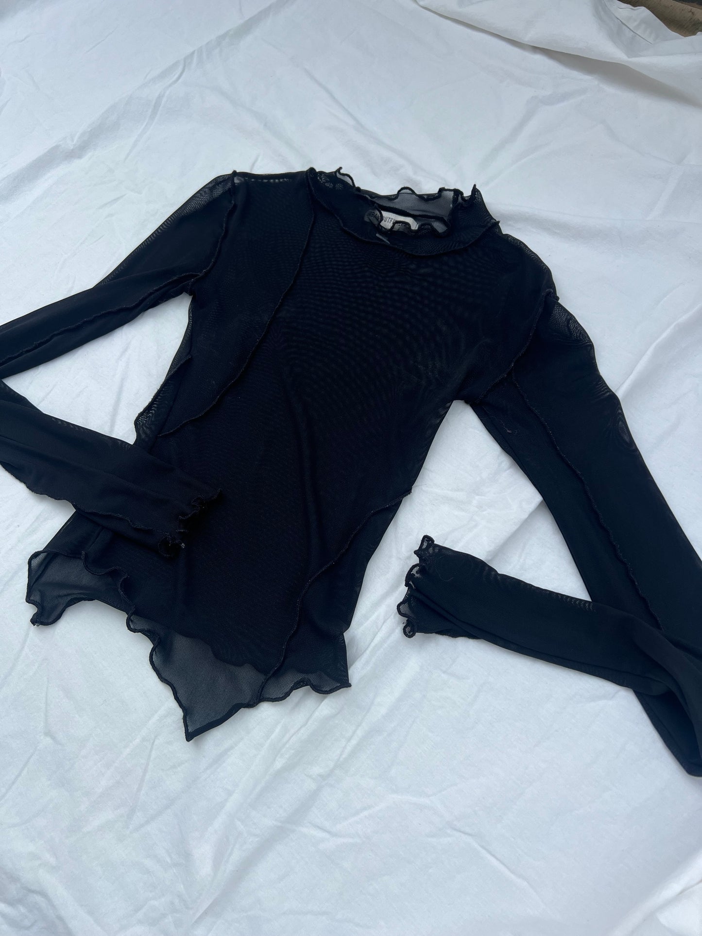 Sam Smith sheer asymmetrical top