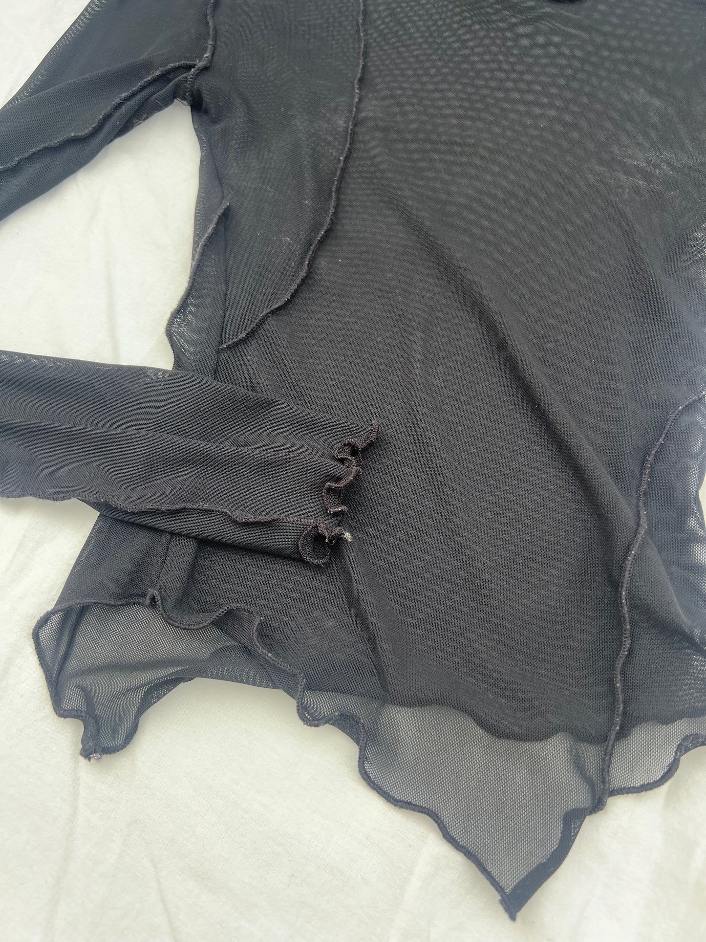 Sam Smith sheer asymmetrical top