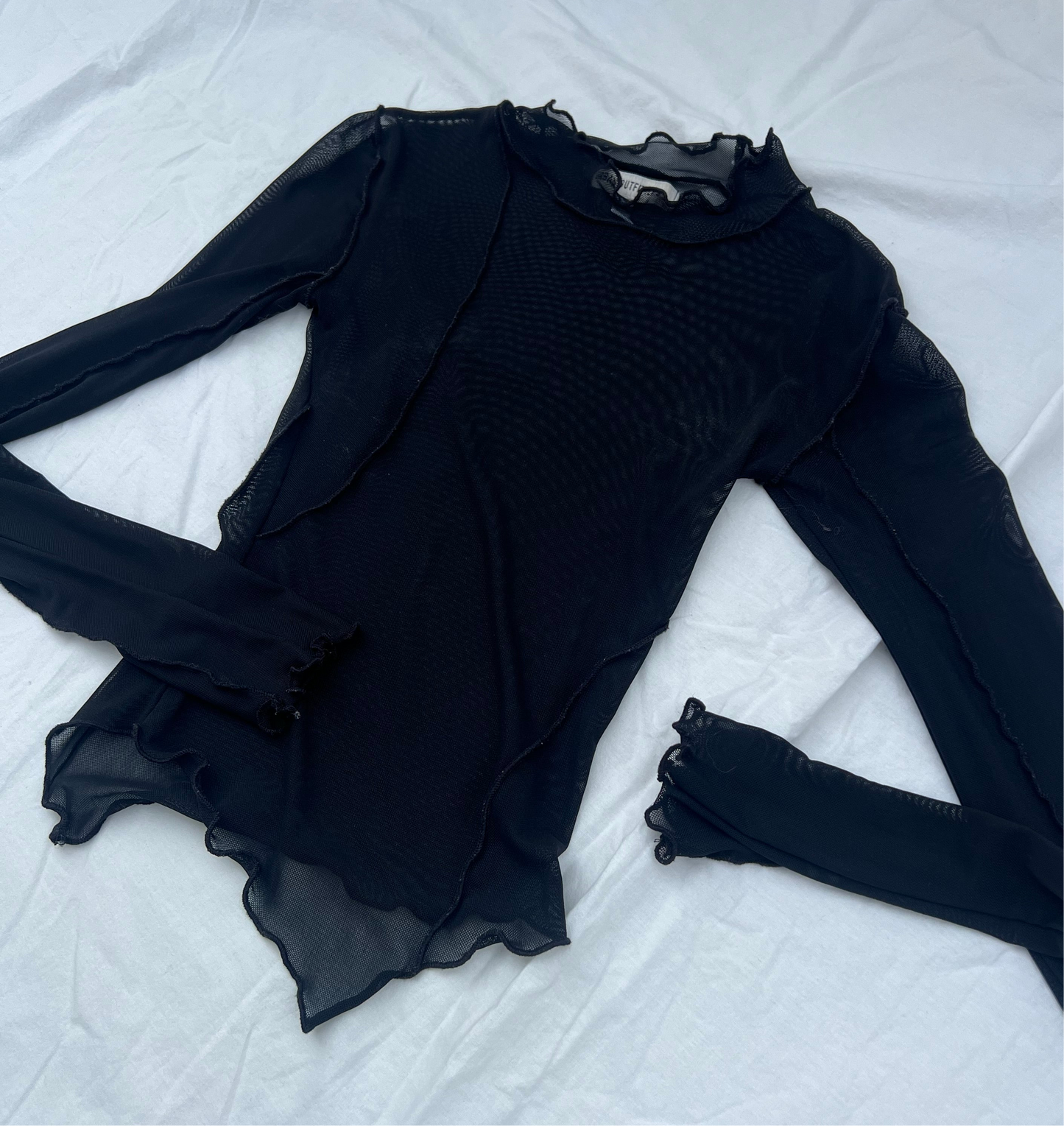 Sam Smith sheer asymmetrical top