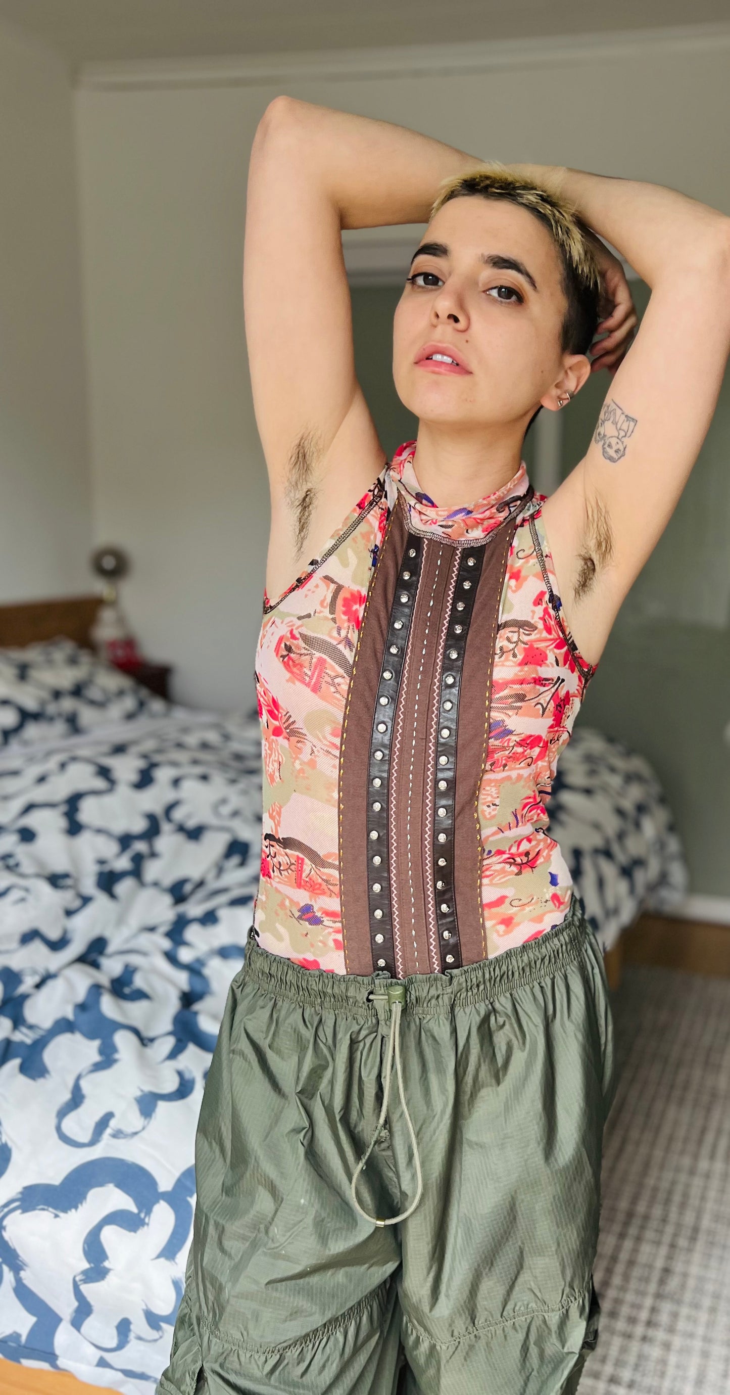 Demi Lovato leather trim studded tank by Parasuco