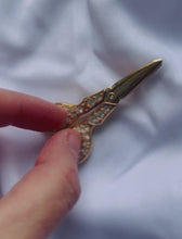 Load and play video in Gallery viewer, Sapphic Scissor Brooch
